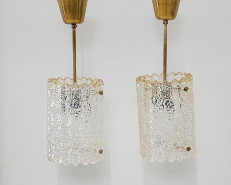 Carl Fagerlund, taklampor, ett par, glas/mässing, Orrefors, 1900-talets andra hälft.