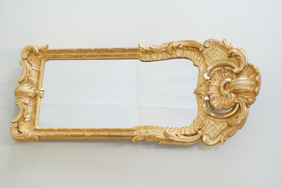 Spegel, träskuren förgylld och bronserad ram, rokokostil, 1800-tal.
