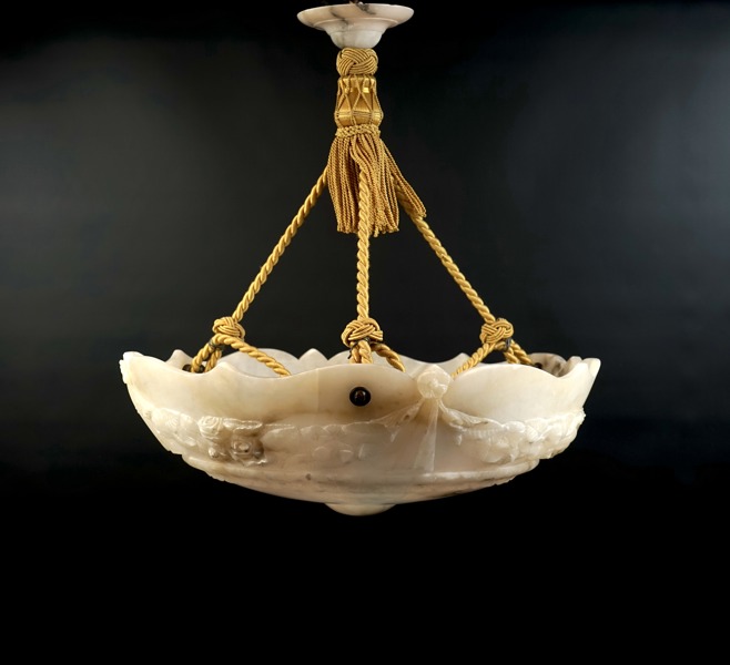 Takampel, alabaster, 1900-talets första hälft.