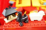 Lego Duplo, ett parti, i förvaringslador, 2 st, bl.a Duplo bilbana.
