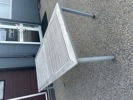 Bord med butterflyskiva samt 6 stolar, teak/metall/plastrotting.