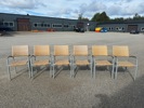 Bord med butterflyskiva samt 6 stolar, teak/metall/plastrotting.