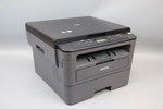 Multiskrivare, Brother DCP-L25100, samt kablar.