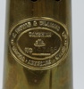 Gruvlykta, mässing/glas, E. Thomas & Williams Ltd, Wales, 1988.