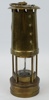 Gruvlykta, mässing/glas, E. Thomas & Williams Ltd, Wales, 1988.