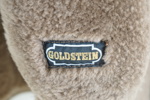 Fårskinnsrock, Goldstein.