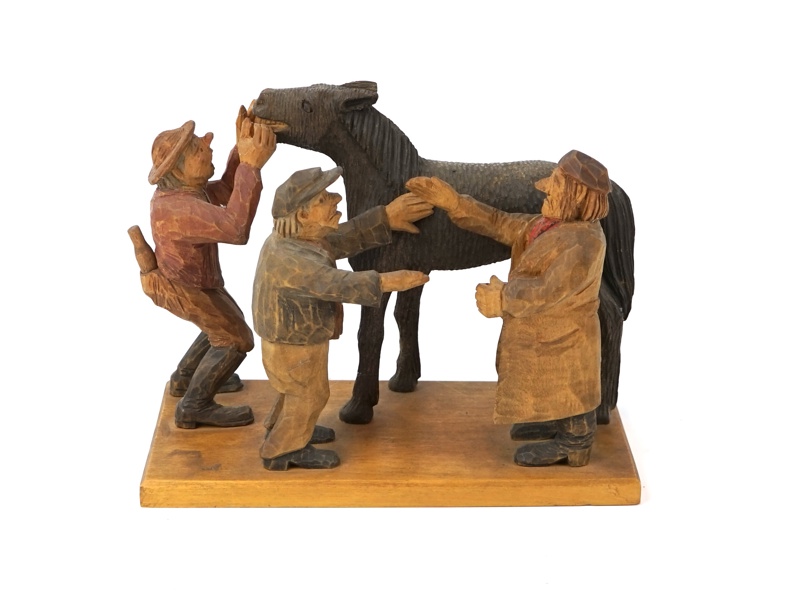 Träfigur, skuren, ''Hästhandel'', osignerad, 1900-tal.