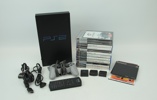 Playstation 2, med tillbehör och 12 st spel.