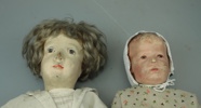 Dockor, 2 st, ett huvud i celluloid, 1900-talets första del.