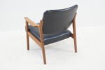 Fåtölj, teak/konstskinn, 1900-talets andra hälft.