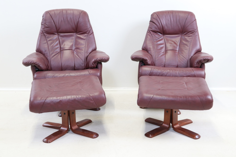 Snurrfåtöljer, ställbara, med fotpallar, ett par, skinn/trä, Anderssons.