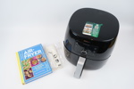 Airfryer med tillbehör, Philips Avance Collection Airfryer XXL, och kokbok.