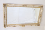 Spegel, bemålat trä, delvis förgylld, fasettslipat glas, rokokostil, 1900-talets andra hälft.