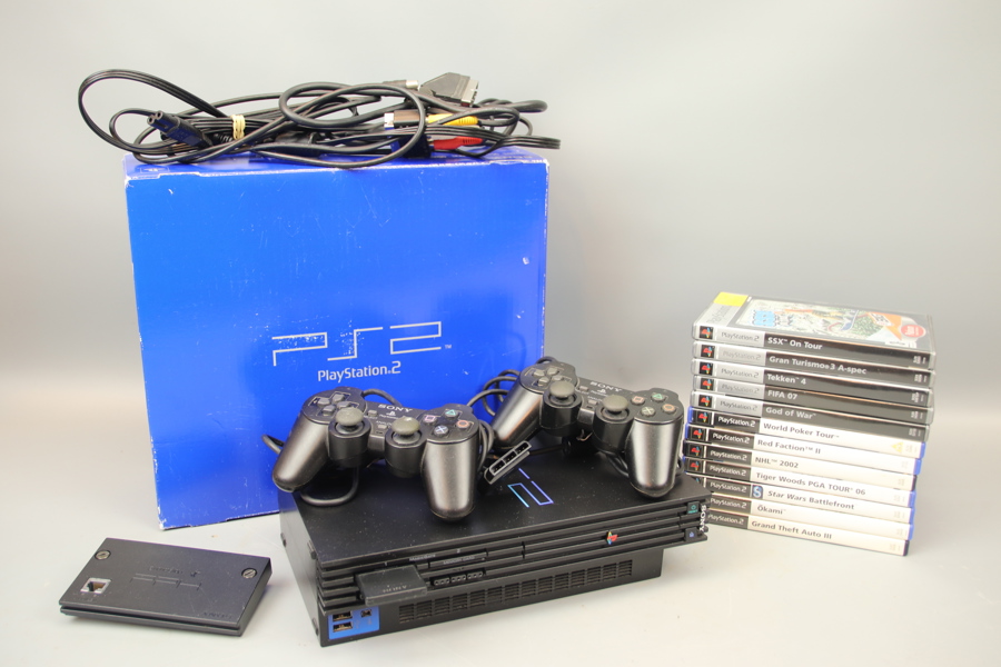 Playstation 2, med tillbehör och 12 spel.