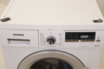 Tvättmaskin, Siemens WM14Q451DN, samt droppskydd.