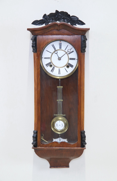 Väggur, trä/metall/glas.