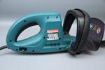 Häcksax, eldriven, Makita UH6330.