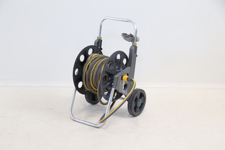 Slangvinda med slang, plast/metall.