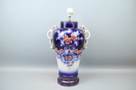 Lockurna omgjord till bordslampa, flintgods, 1900-tal.