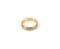 Halvalliansring, vitt/rött guld 18K, besatt med 8 små briljanter, 1974.