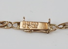 Armlänk med 11 berlocker, 18K guld.