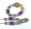 Collier och armlänk med fasettslipade blå stenar och caméer, filigranarbete.