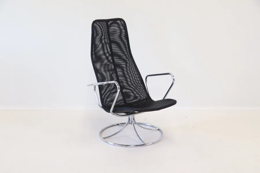 Tord Björklund, snurrfåtölj, krom/plast, "Exen", IKEA.