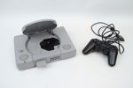Spelkonsoll, Sony Playstation, samt handkontroll.