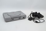 Spelkonsoll, Sony Playstation, samt handkontroll.