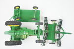 Leksakstraktor med 2 st tillbehör, metall, ''John Deere'', ERTL.