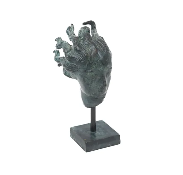 Carl Milles, efter, skulptur, grönpatinerad brons i form av änglahuvud, muséekopia, otydligt stämplad.