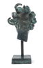 Carl Milles, efter, skulptur, grönpatinerad brons i form av änglahuvud, muséekopia, otydligt stämplad.