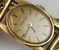 Omega De Ville, armbandsur, dam, 18K guld, manuell, med x-flätad länk 18K guld, 1960/70-tal.