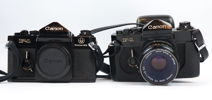 Kameror, 2 st, Canon F-1 med tillbehör.