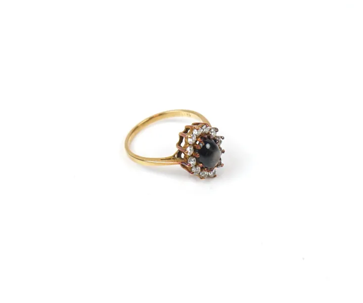 Ring, carmose med röktopas och kvarts, guld 18K.